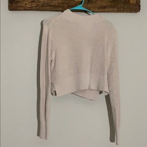 Neutral tone cropped sweater with mock neck